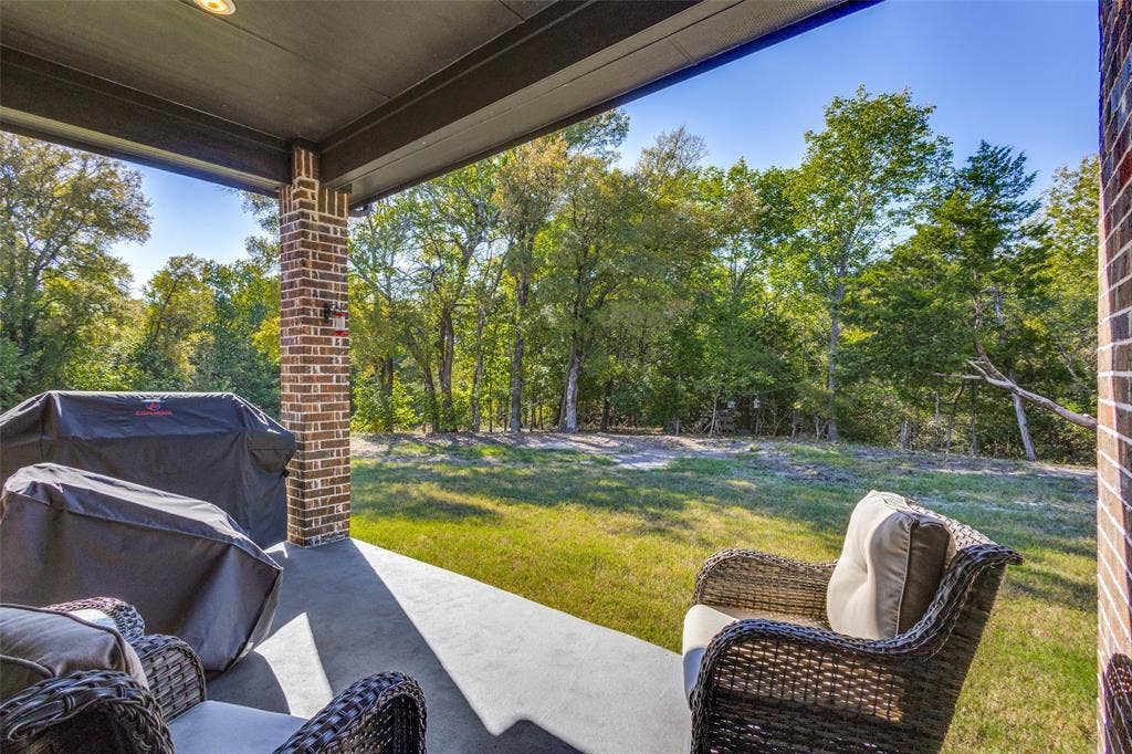 Covered patio featuring a solid ceiling and recessed lighting