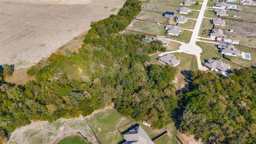 Expansive wooded acreage with a cleared perimeter and undeveloped open land