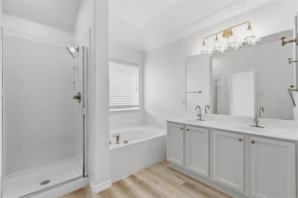 10709 Nantucket Drive, Rowlett, TX 75089 Dual vanity with undermount sinks and light-finish cabinetry