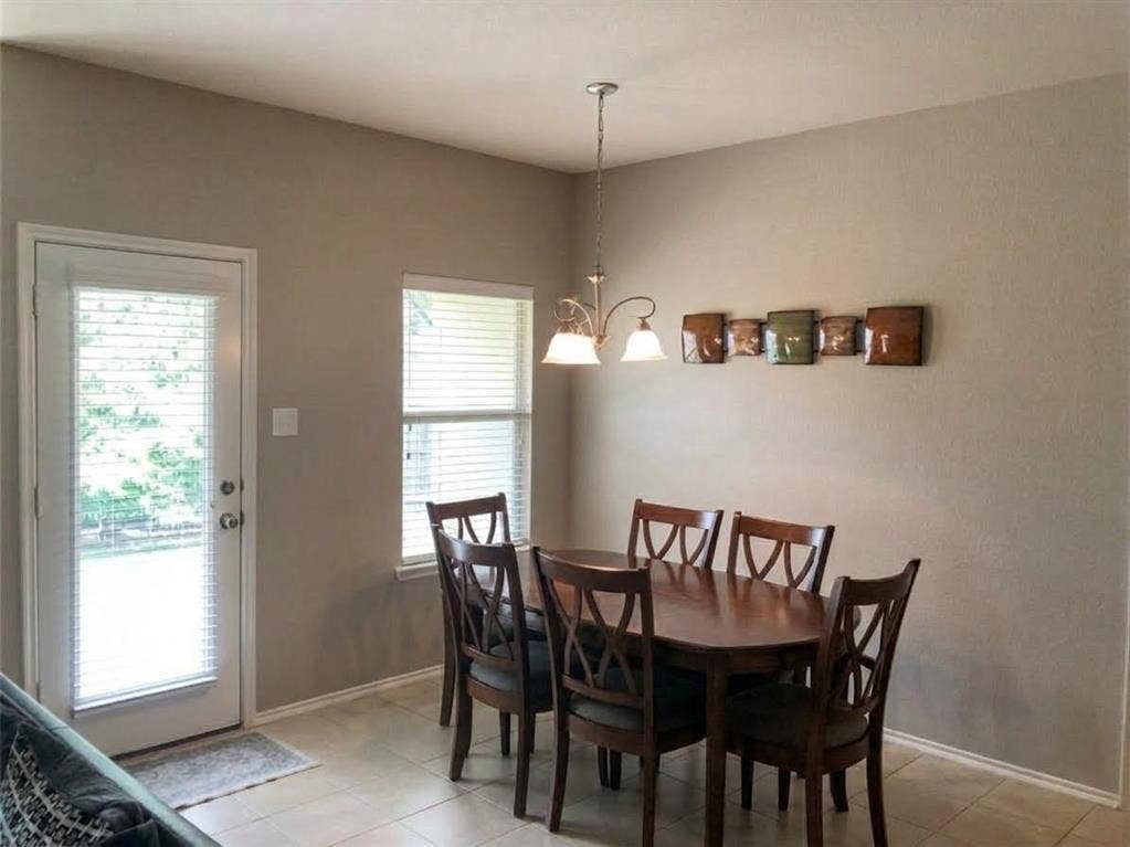 Dining area overlooking backyard.