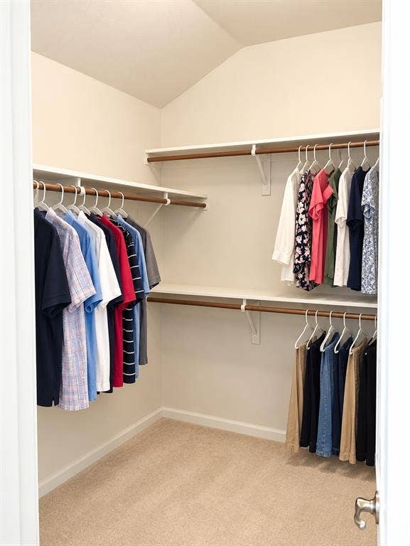 Walk-in closet off of primary bathroom.