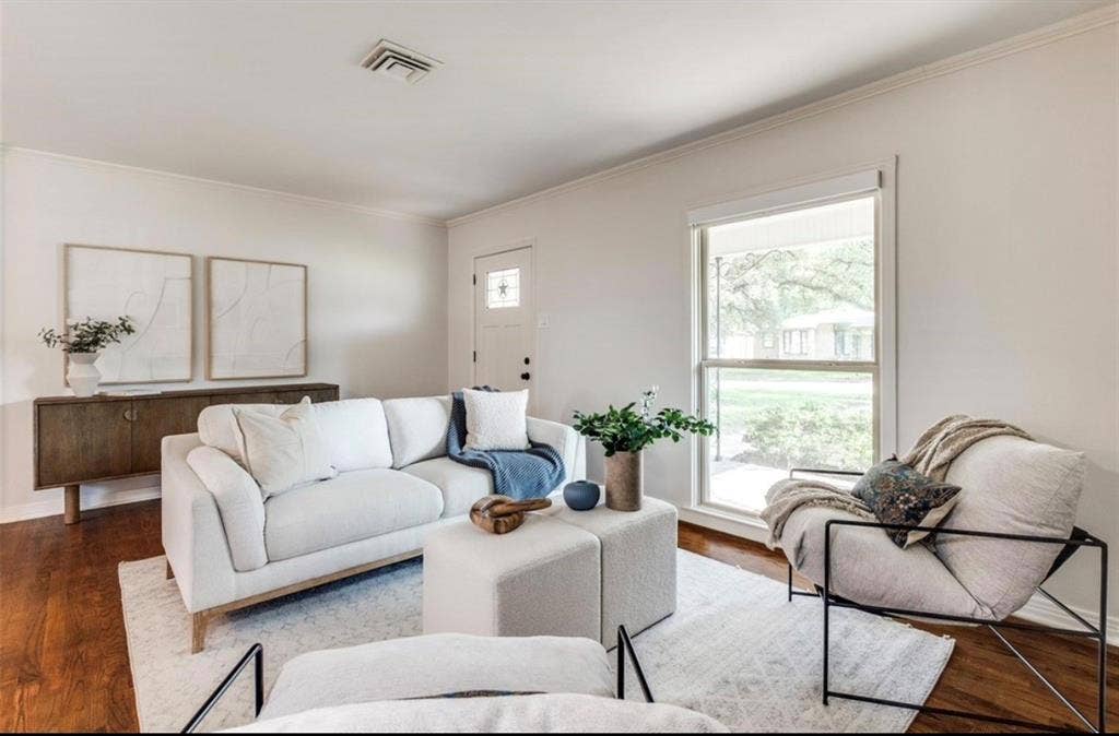 1323 Engle Avenue, Dallas, TX 75224 Hardwood flooring, crown molding, white walls, and a white entry door with a decorative glass insert