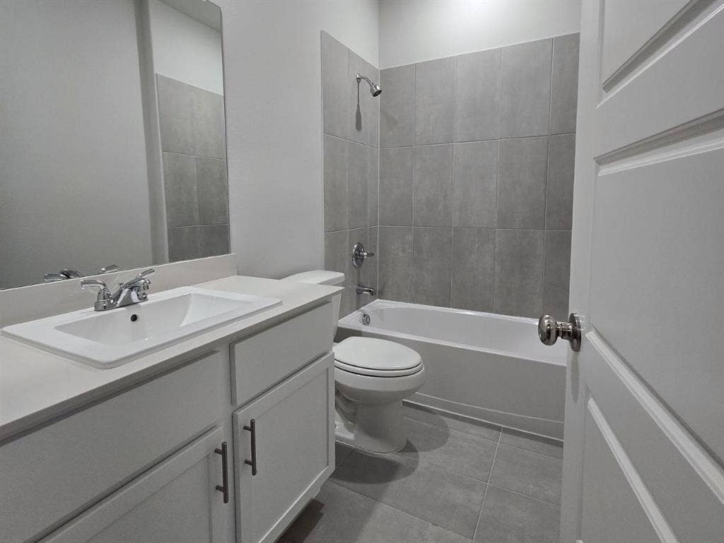 841 Rockcloud Drive, Fort Worth, TX 76052 White vanity with integrated sink, chrome faucet, and rectangular mirror