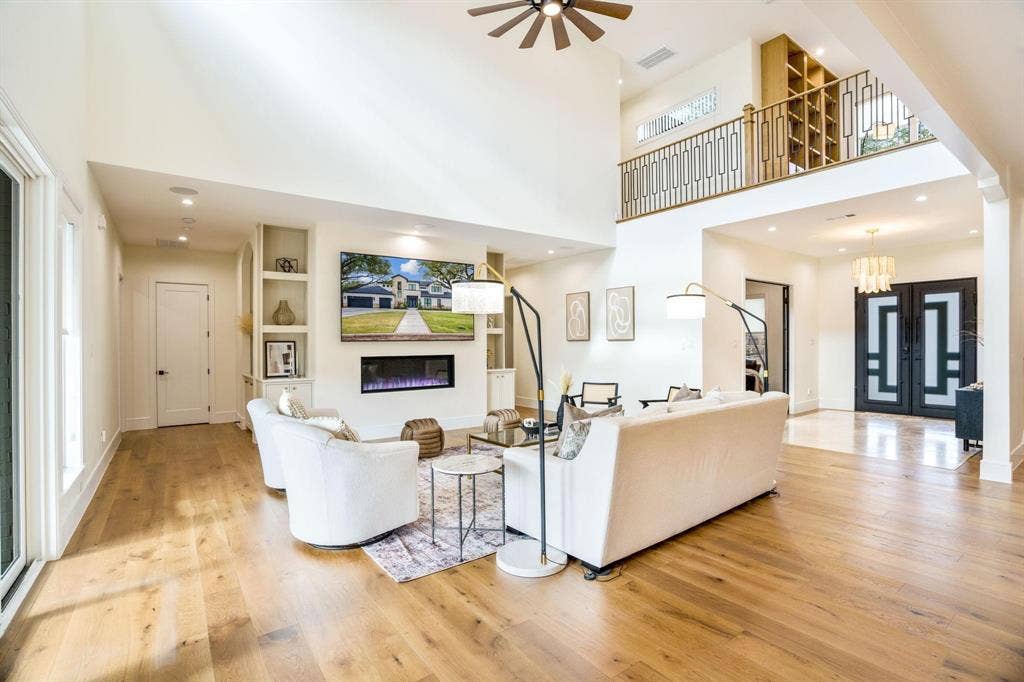 12007 Quincy Lane, Dallas, TX 75230 Vaulted ceiling with a ceiling fan, recessed lighting, and wood-finish flooring
