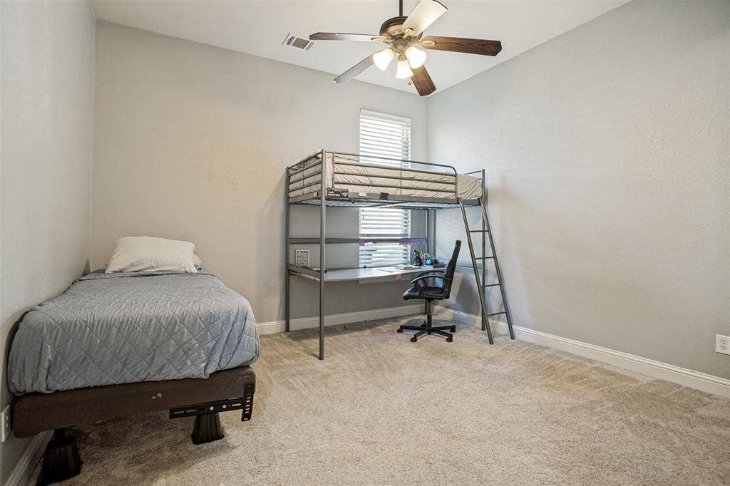 1250 Packsaddle Trail, Prosper, TX 75078 Vaulted ceiling, ceiling fan with light fixture, window with blinds, light gray wall paint, and carpeting
