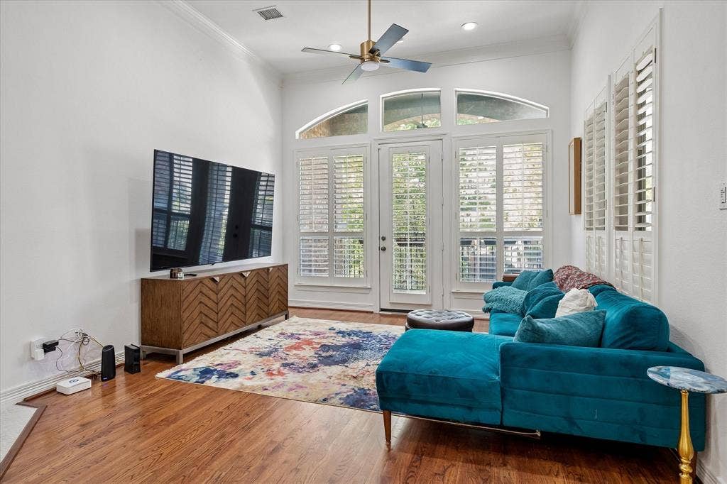 2916 Thomas Avenue, Dallas, TX 75204 Vaulted ceiling featuring a ceiling fan, recessed lighting, hardwood flooring, and French doors with custom plantation shutters