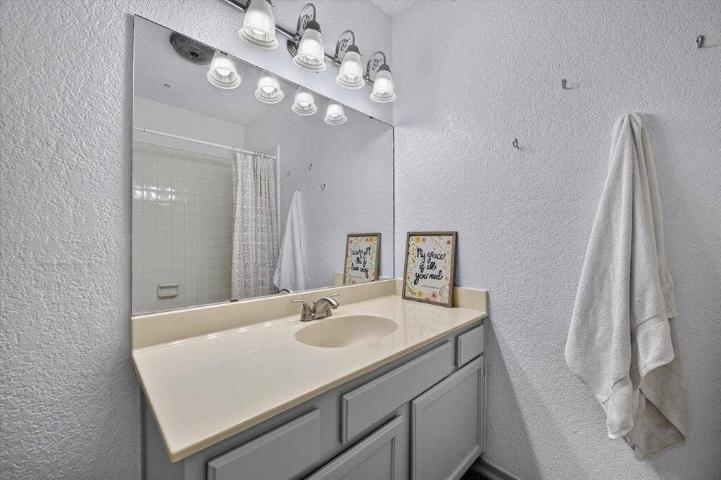 Fresh paint and flooring in the bathrooms give this space a clean and modern feel