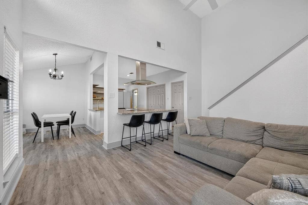 Open floor plan with breakfast bar in the kitchen make this space great for entertaining