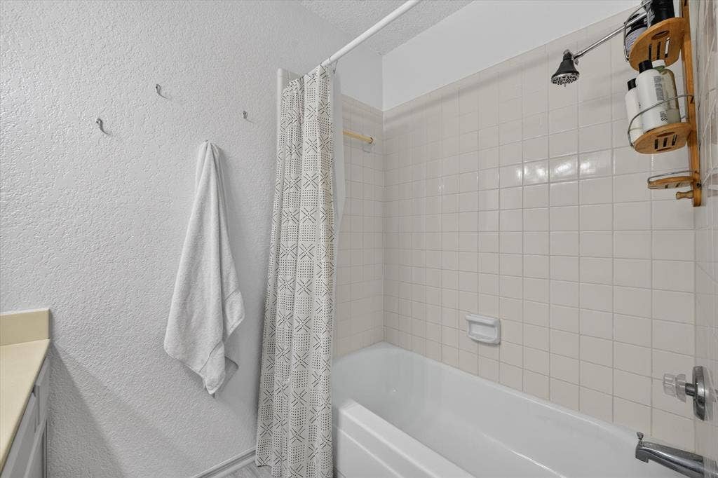 Fresh paint and flooring in the bathrooms give this space a clean and modern feel