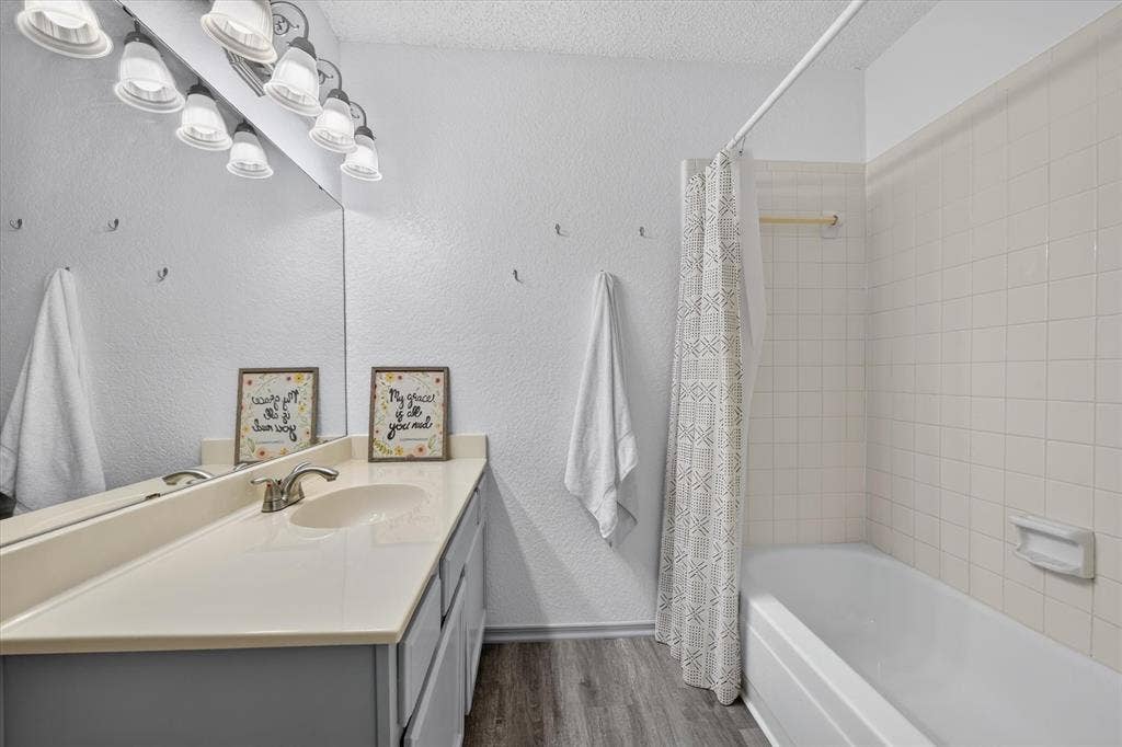 Fresh paint and flooring in the bathrooms give this space a clean and modern feel