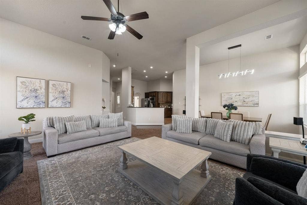 2901 Regents Park Lane, Garland, TX 75043 living room is open to the dining room and kitchen, great flow for entertainment