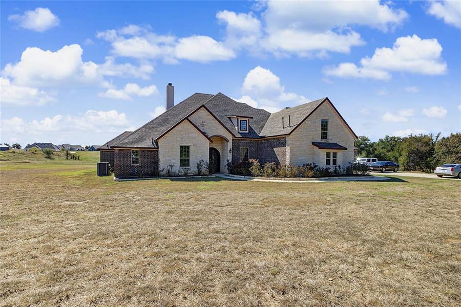 Property photo for 115 Chisum Drive, Millsap, TX