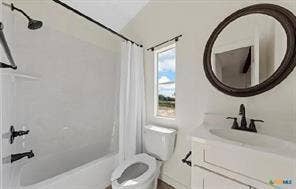 White vanity with integrated sink, black-finish faucet, and coordinating oval mirror