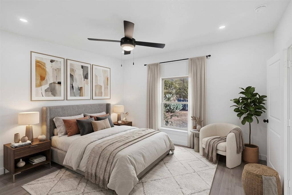 651 Ezekial Avenue, Dallas, TX 75217 Recessed lighting, ceiling fan with integrated light, wood-finish flooring, white paneled door, and window with outdoor scenery