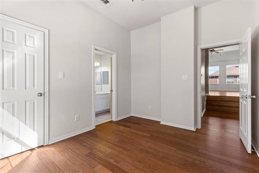 5401 Wolcott Place, Richardson, TX 75082 Wood-finish flooring throughout
