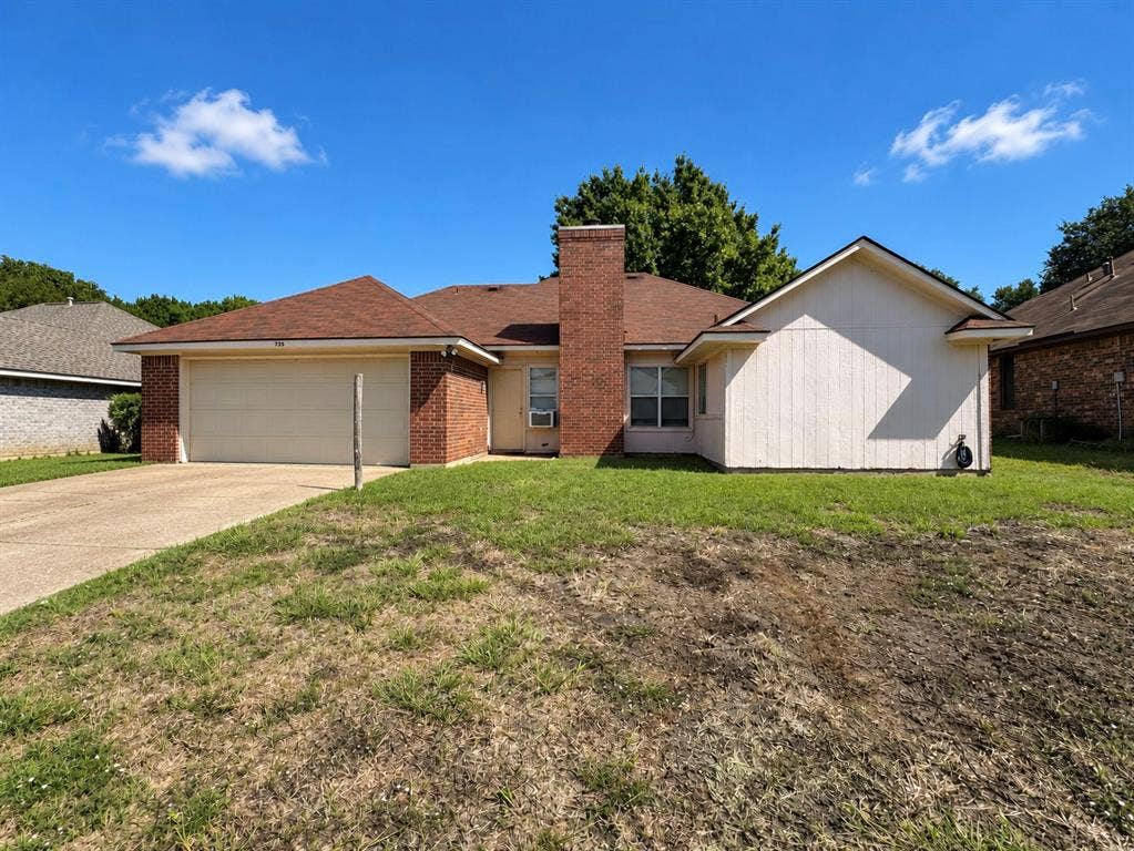 725 Andalusia Trail, DeSoto, TX 75115 Brick and siding exterior with an attached garage, a chimney feature, and a paved driveway