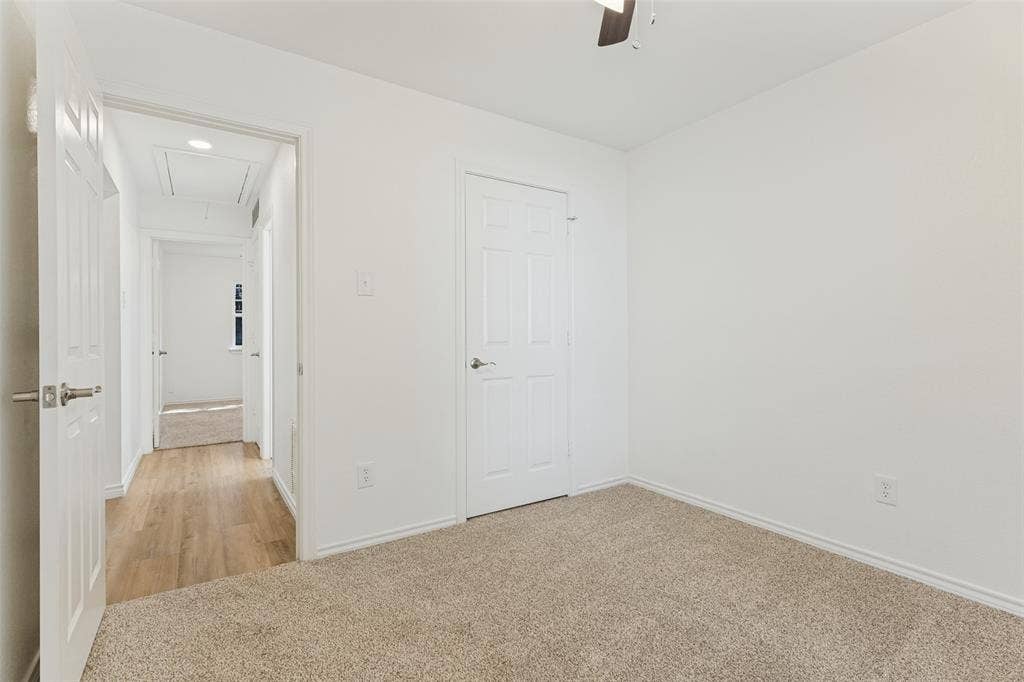 7440 Bear Lake Drive, Fort Worth, TX 76137 Carpeted flooring, white interior doors, and a ceiling fan
