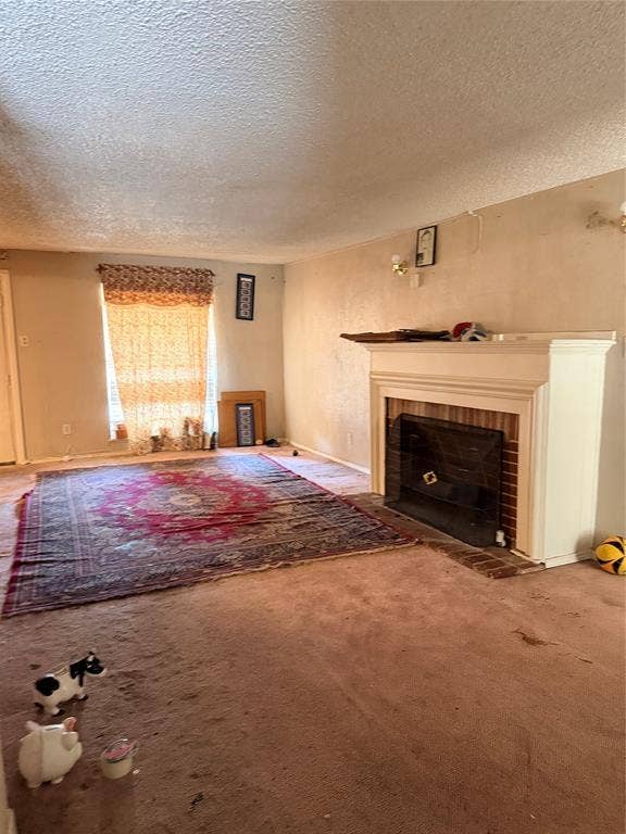 9405 Glengreen Drive, Dallas, TX 75217 Built-in fireplace featuring a brick surround and a white mantelpiece