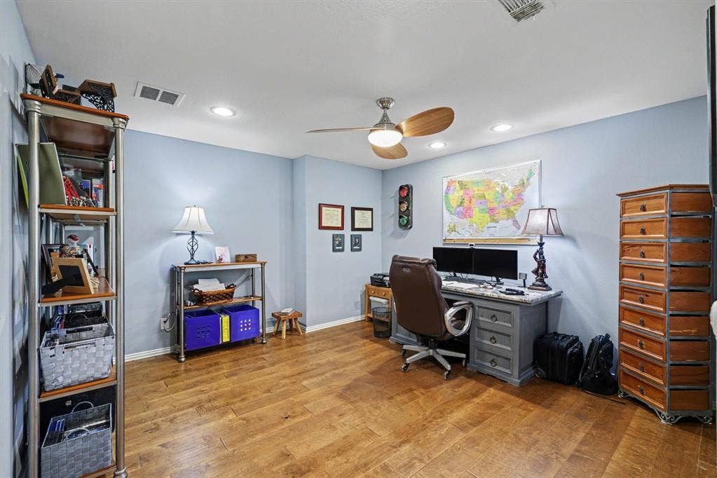 26 Brookhaven Drive, Lucas, TX 75002 Wood-finish flooring, recessed lighting, and a ceiling fan with integrated lighting