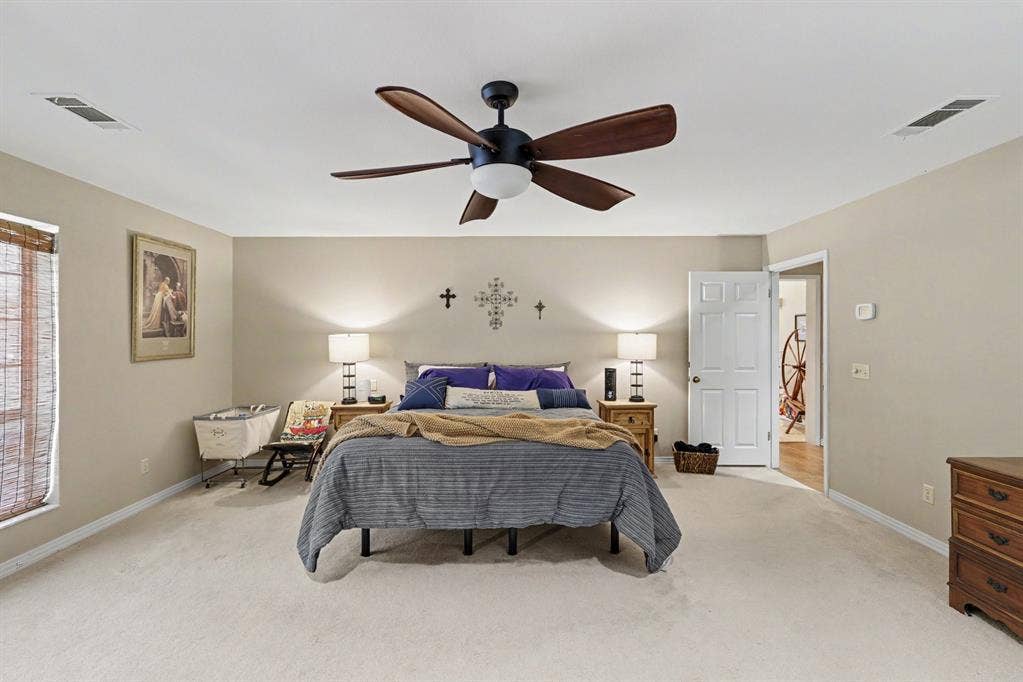 26 Brookhaven Drive, Lucas, TX 75002 Recessed lighting, ceiling fan with light fixture, neutral carpeting, paneled interior door, and window with natural wood blinds