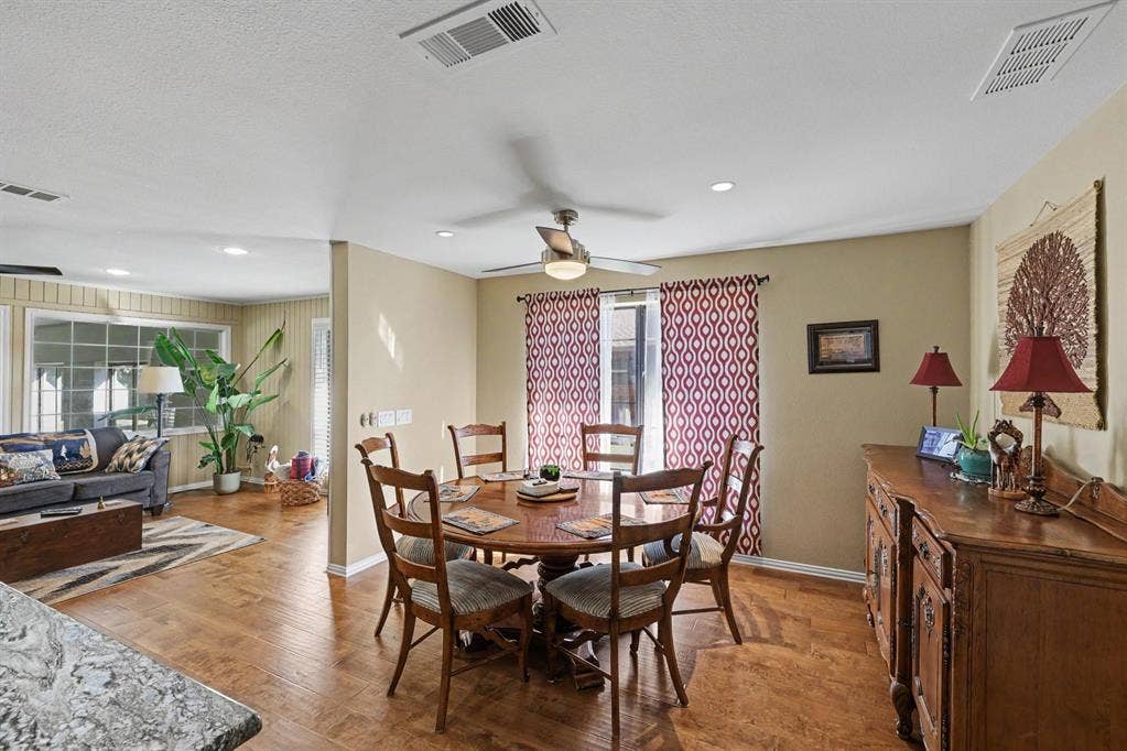 26 Brookhaven Drive, Lucas, TX 75002 Wood-finish flooring throughout, recessed lighting, and a ceiling fan with integrated lighting