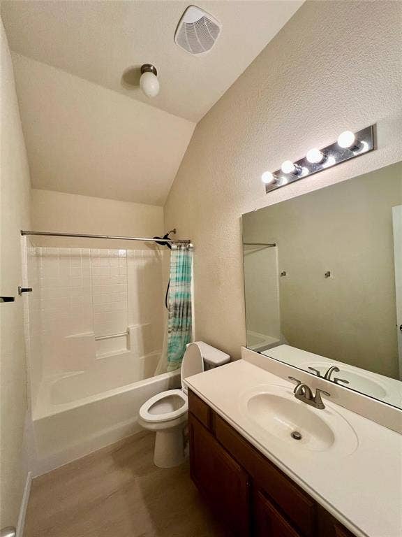 1801 Kathryn Court, Arlington, TX 76018 Bathroom featuring a white bathtub, toilet, and vanity with a single basin sink