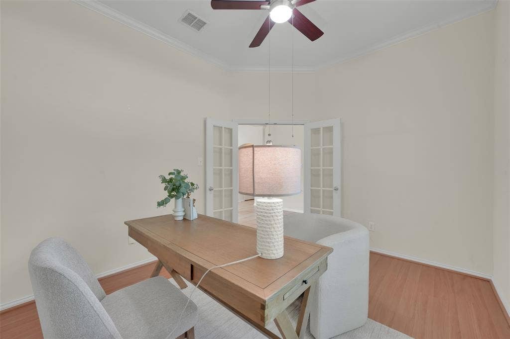 French doors, crown molding, wood-finish flooring, ceiling fan, recessed lighting