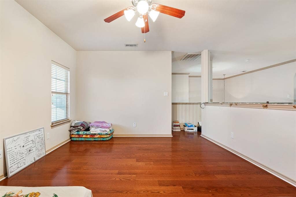 1620 Secretariat Lane, Irving, TX 75060 Game Room upstairs with open to below into the Living Room