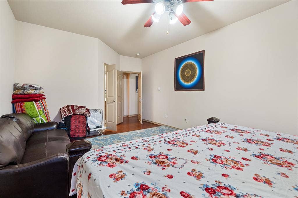 1620 Secretariat Lane, Irving, TX 75060 Primary Bedroom with lots of natural light and ceiling fan