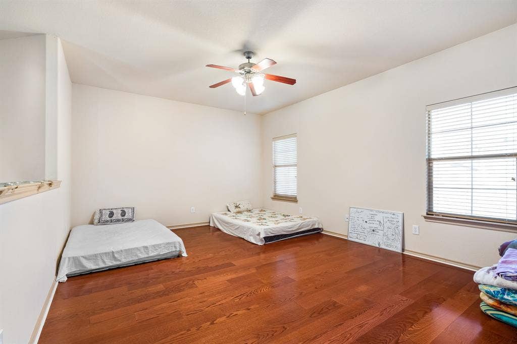 1620 Secretariat Lane, Irving, TX 75060 Game Room upstairs with lots of natural light and ceiling fan