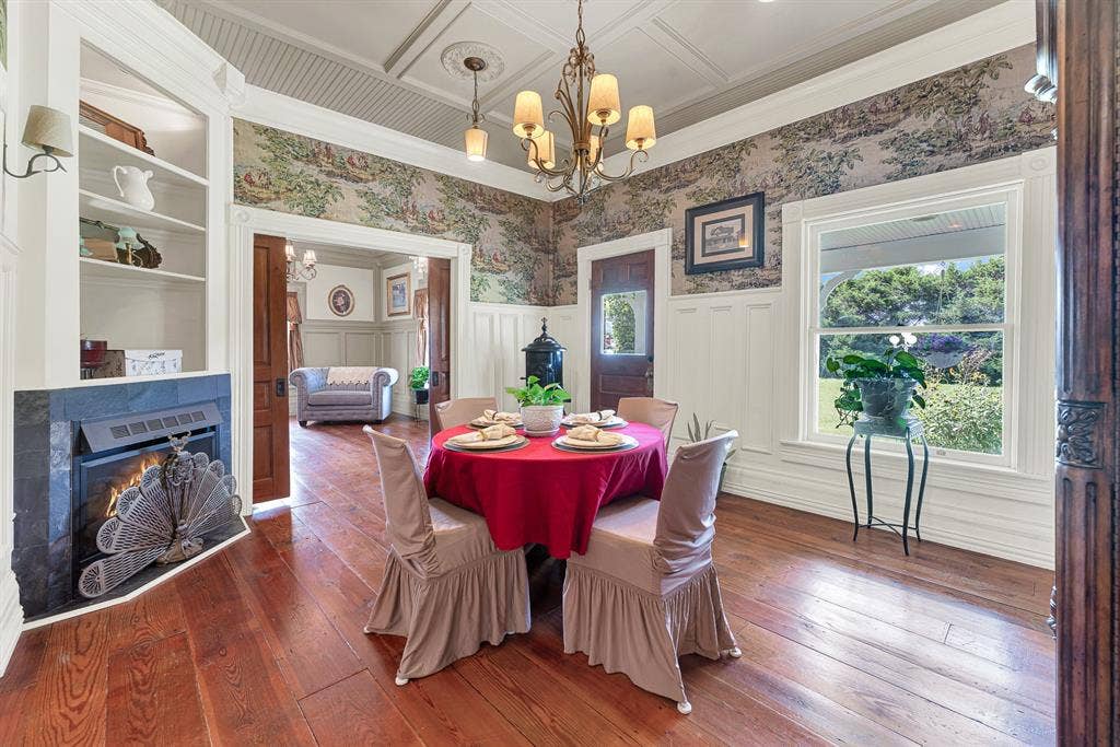 1425-1 Lone Star Road, Celina, TX 75009 Detailed millwork, oversized windows, and carefully recreated Victorian craftsmanship give the dining room a warm, timeless elegance. Holiday celebrations, family dinners, and milestone moments all feel right at home here.
