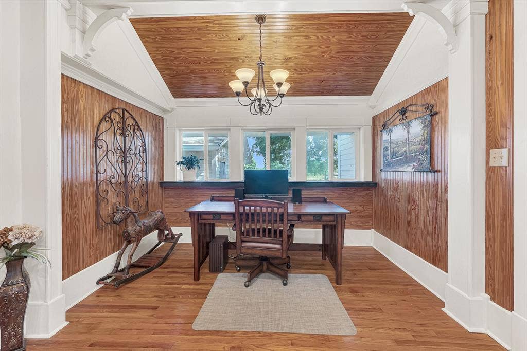 1425-1 Lone Star Road, Celina, TX 75009 Sunlight pours through a wall of windows, while warm wood accents and detailed trim give this office a comfortable, timeless feel. It's an inspiring place to work during the day, then close the laptop and enjoy the peaceful views beyond the glass.