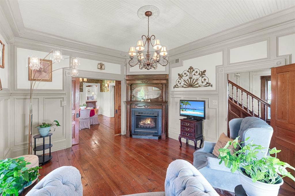 1425-1 Lone Star Road, Celina, TX 75009 Original Victorian character lives on through the carefully recreated moldings, trim, and woodwork found throughout this elegant gathering space. Everyday moments feel a little more meaningful in a room designed for slowing down and connecting.