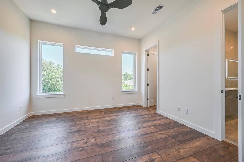 2247 Mail Avenue, #101, Dallas, TX 75235 Wood-finish flooring, recessed lighting, and a ceiling fan