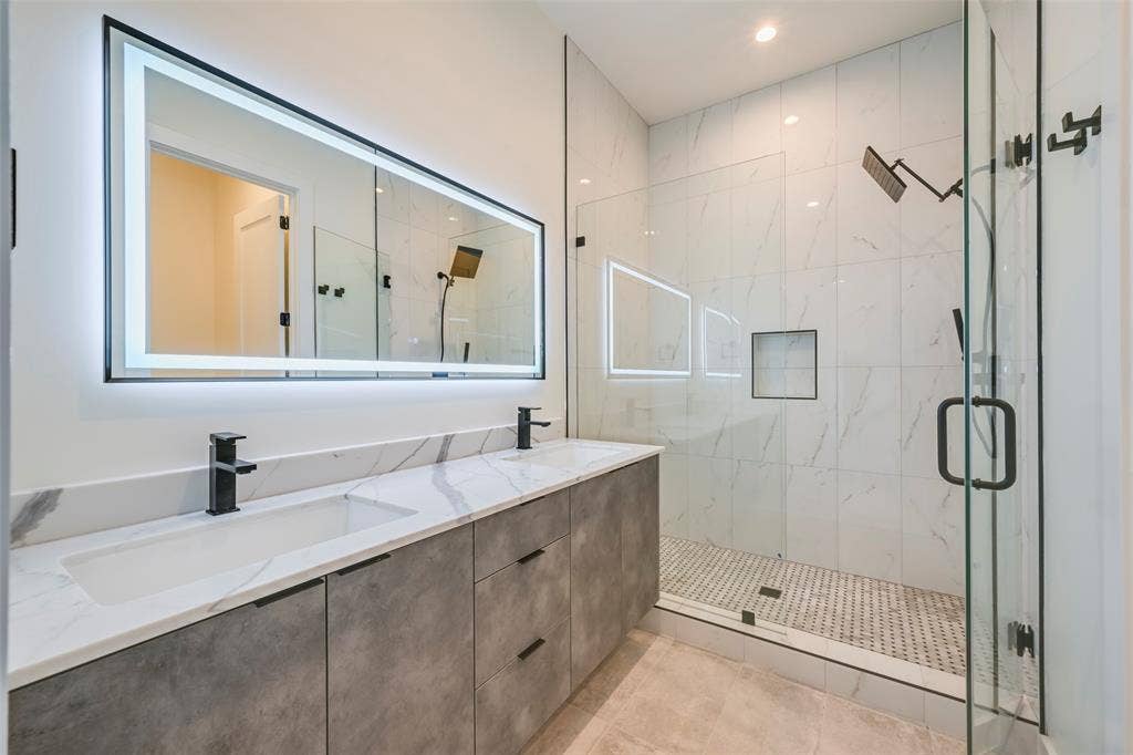 2247 Mail Avenue, #101, Dallas, TX 75235 Double vanity with undermount sinks and matte black fixtures