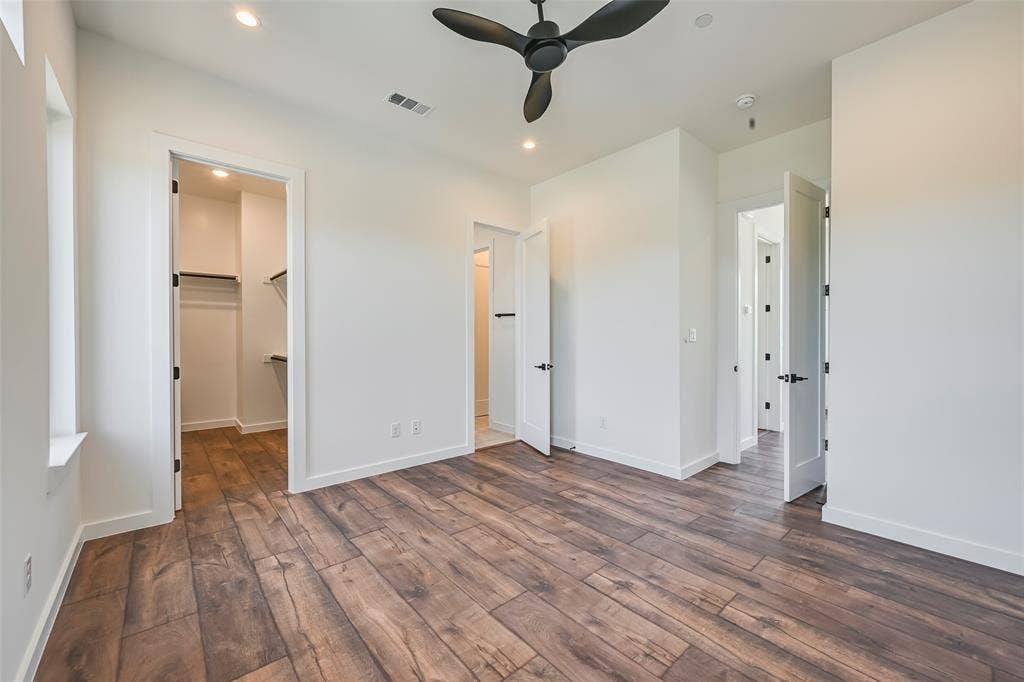2247 Mail Avenue, #101, Dallas, TX 75235 Spacious room featuring wood-finish flooring, recessed lighting, and a contemporary ceiling fan