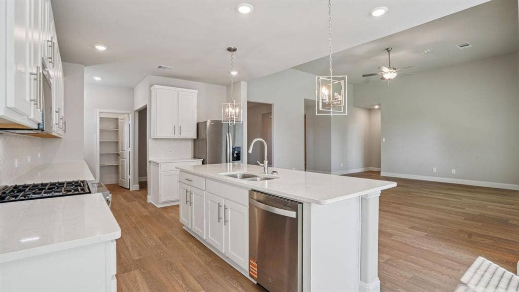 1301 Winters Way, Princeton, TX 75071 Photo is not of the actual home, but is an inspirational photo of builder’s model home and may depict options, furnishings, and/or decorator features that are not included.