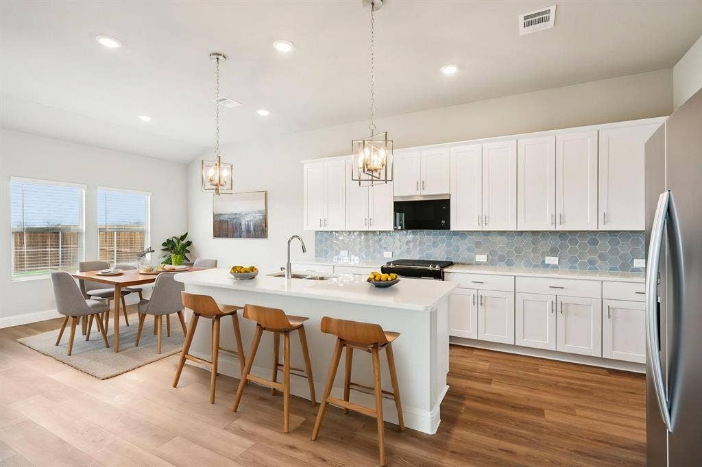 1211 Winters Way, Princeton, TX 75071 Photo is not of the actual home, but is an inspirational photo of builder’s model home and may depict options, furnishings, and/or decorator features that are not included.