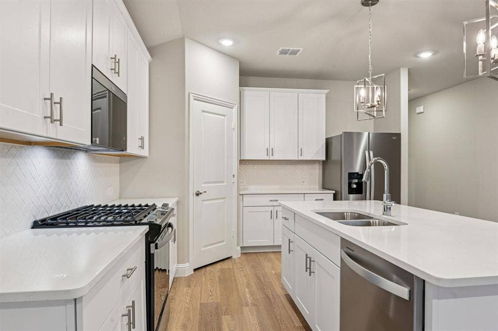1202 Morrell Drive, Princeton, TX 75071 Photo is not of the actual home, but is an inspirational photo of builder’s model home and may depict options, furnishings, and/or decorator features that are not included.