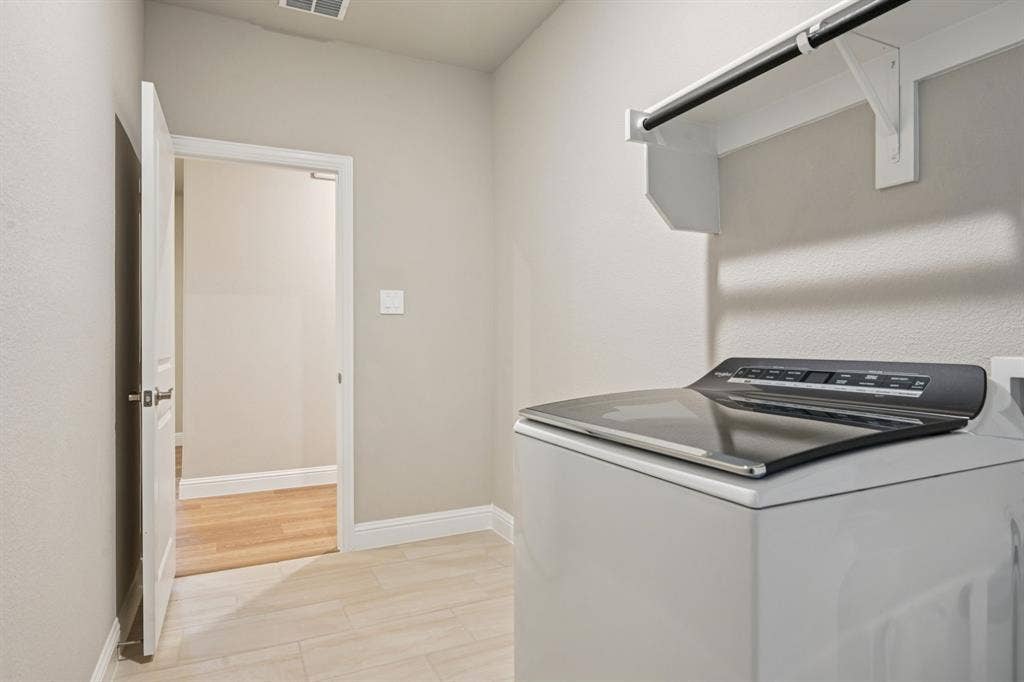 1202 Morrell Drive, Princeton, TX 75071 Photo is not of the actual home, but is an inspirational photo of builder’s model home and may depict options, furnishings, and/or decorator features that are not included.