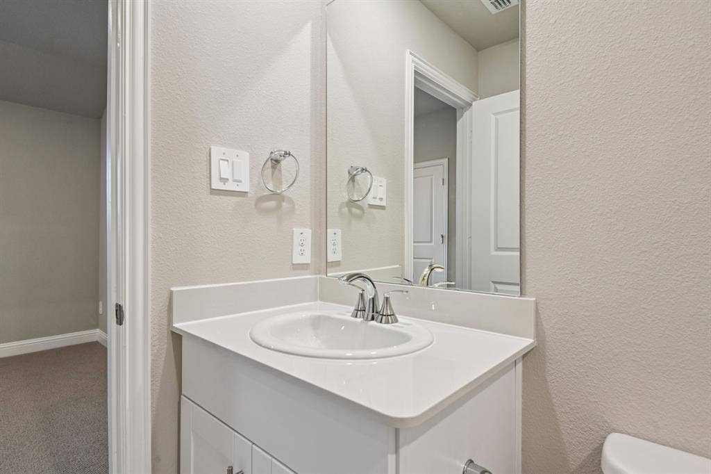 1202 Morrell Drive, Princeton, TX 75071 Photo is not of the actual home, but is an inspirational photo of builder’s model home and may depict options, furnishings, and/or decorator features that are not included.