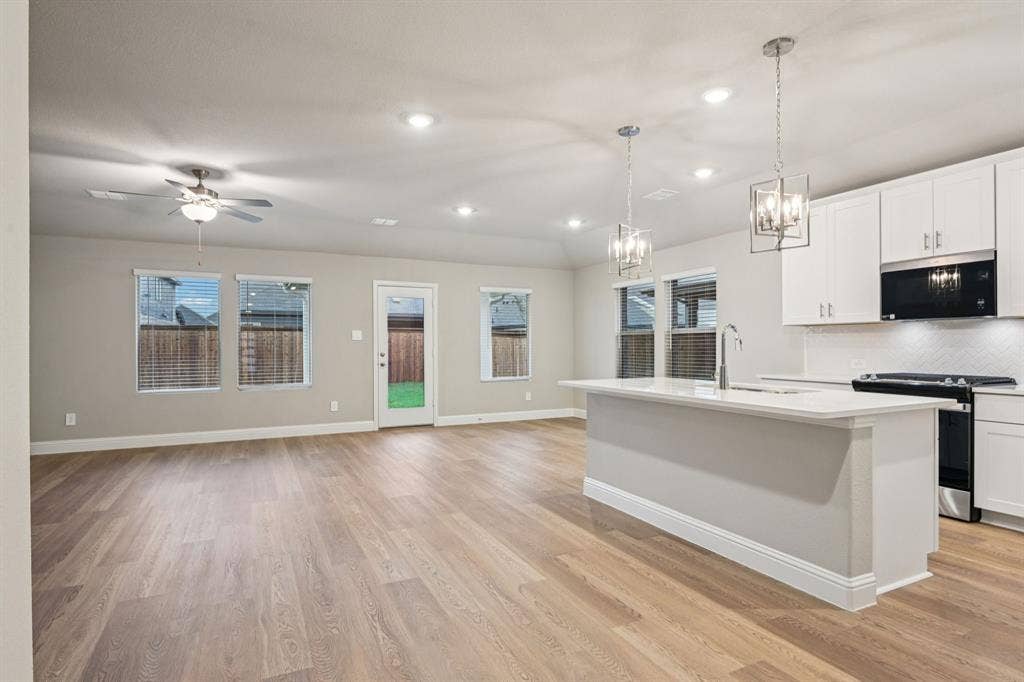 1202 Morrell Drive, Princeton, TX 75071 Photo is not of the actual home, but is an inspirational photo of builder’s model home and may depict options, furnishings, and/or decorator features that are not included.
