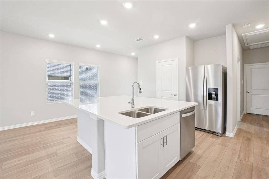 205 Decoursey Drive, Princeton, TX 75071 Photo is not of the actual home, but is an inspirational photo of builder’s model home and may depict options, furnishings, and/or decorator features that are not included.