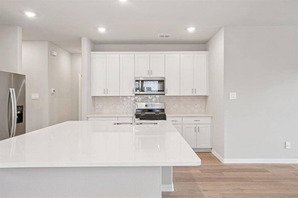 205 Decoursey Drive, Princeton, TX 75071 Photo is not of the actual home, but is an inspirational photo of builder’s model home and may depict options, furnishings, and/or decorator features that are not included.