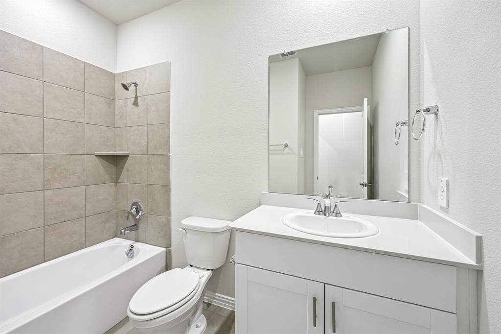 203 Decoursey Drive, Princeton, TX 75071 Photo is not of the actual home, but is an inspirational photo of builder’s model home and may depict options, furnishings, and/or decorator features that are not included.