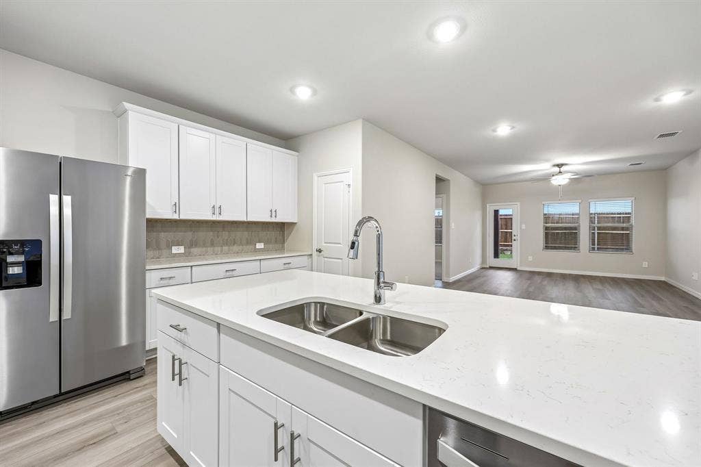 203 Decoursey Drive, Princeton, TX 75071 Photo is not of the actual home, but is an inspirational photo of builder’s model home and may depict options, furnishings, and/or decorator features that are not included.