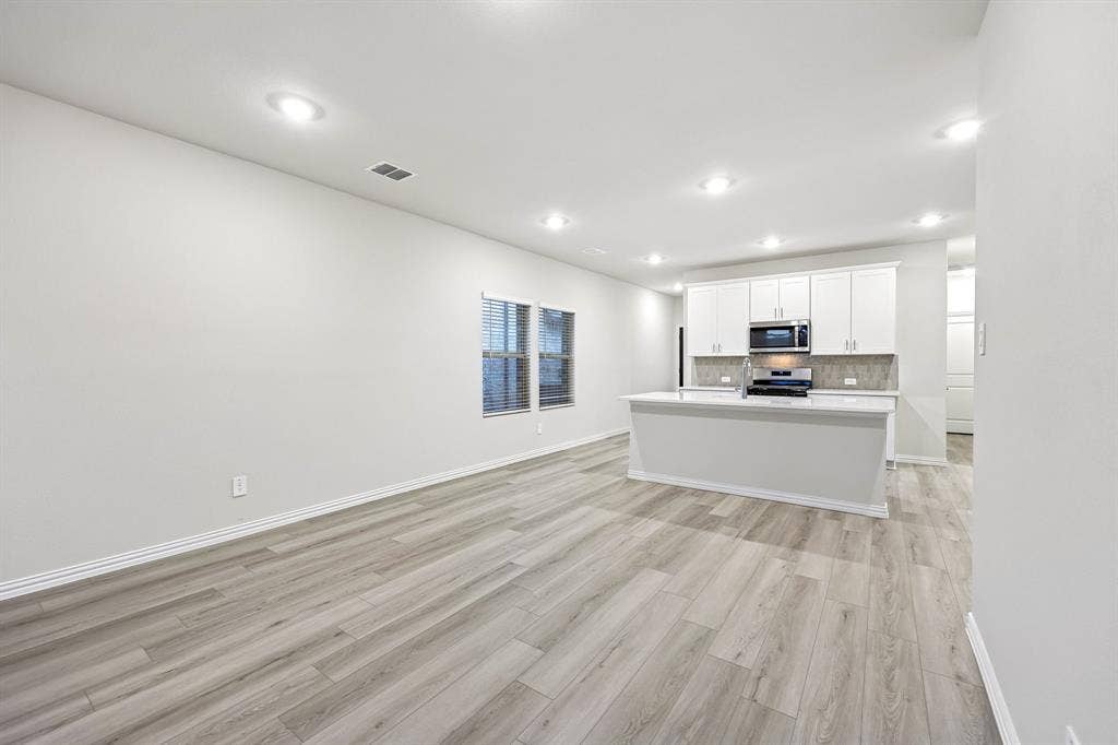 203 Decoursey Drive, Princeton, TX 75071 Photo is not of the actual home, but is an inspirational photo of builder’s model home and may depict options, furnishings, and/or decorator features that are not included.
