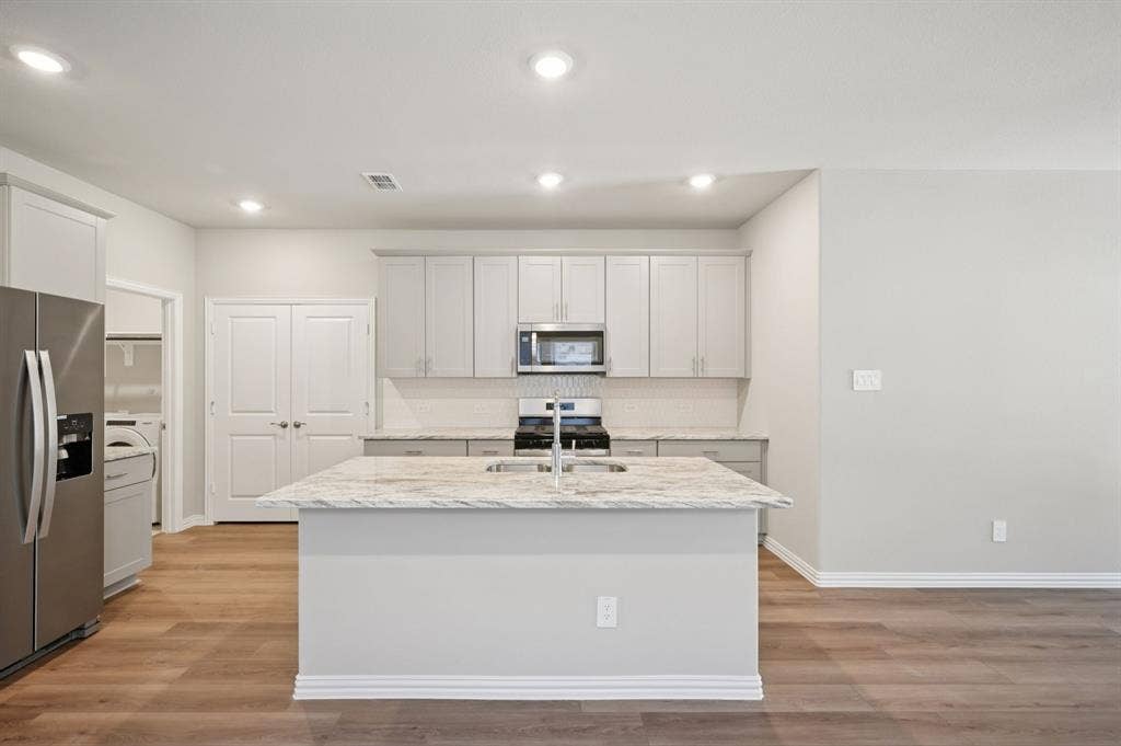 201 Decoursey Drive, Princeton, TX 75071 Photo is not of the actual home, but is an inspirational photo of builder’s model home and may depict options, furnishings, and/or decorator features that are not included.