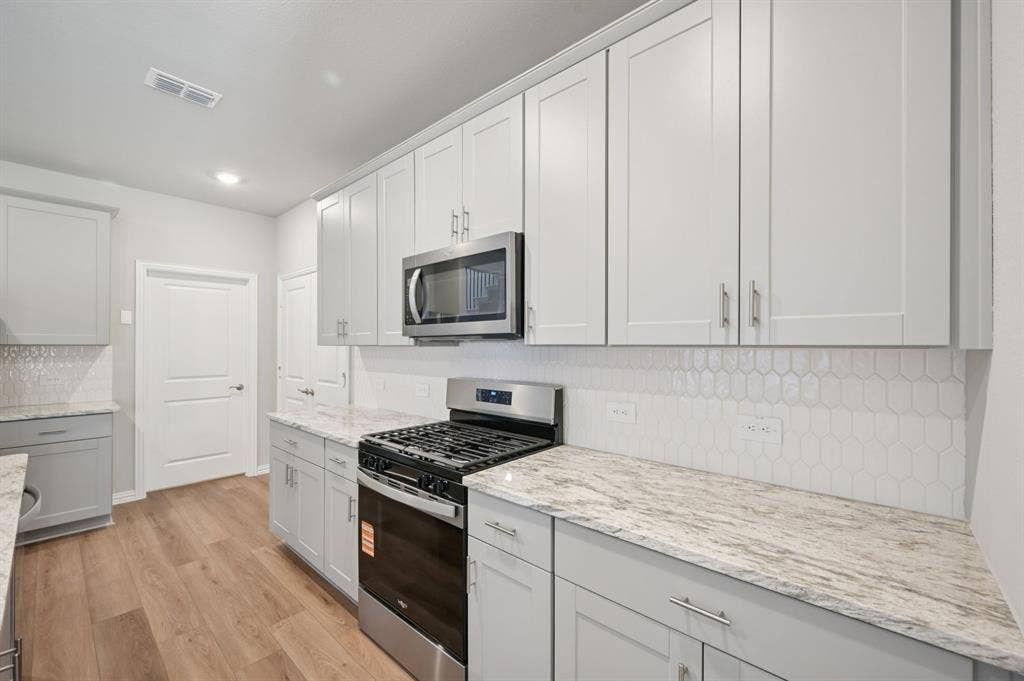 201 Decoursey Drive, Princeton, TX 75071 Photo is not of the actual home, but is an inspirational photo of builder’s model home and may depict options, furnishings, and/or decorator features that are not included.