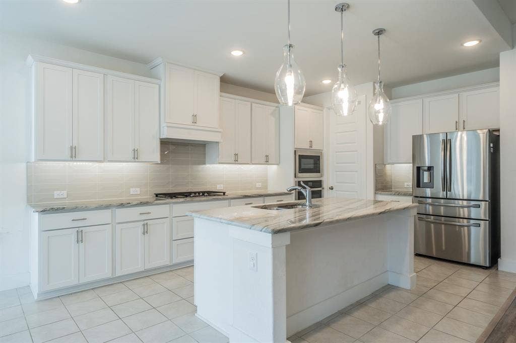 821 Reynolds Drive, Fate, TX 75087 821 Reynolds Drive, Fate, TX 75087